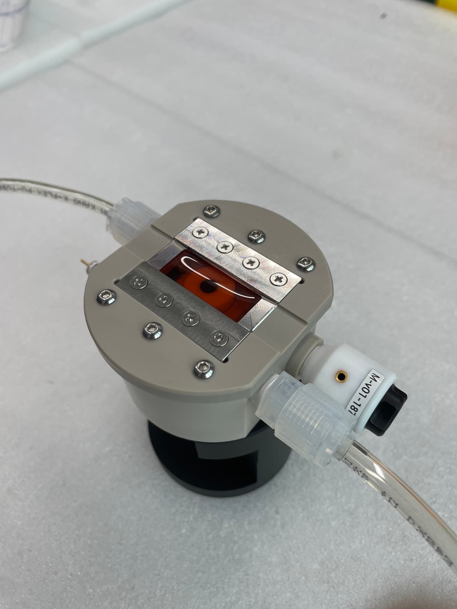 ISFEC physical system with the measurement window and fluid lines connected